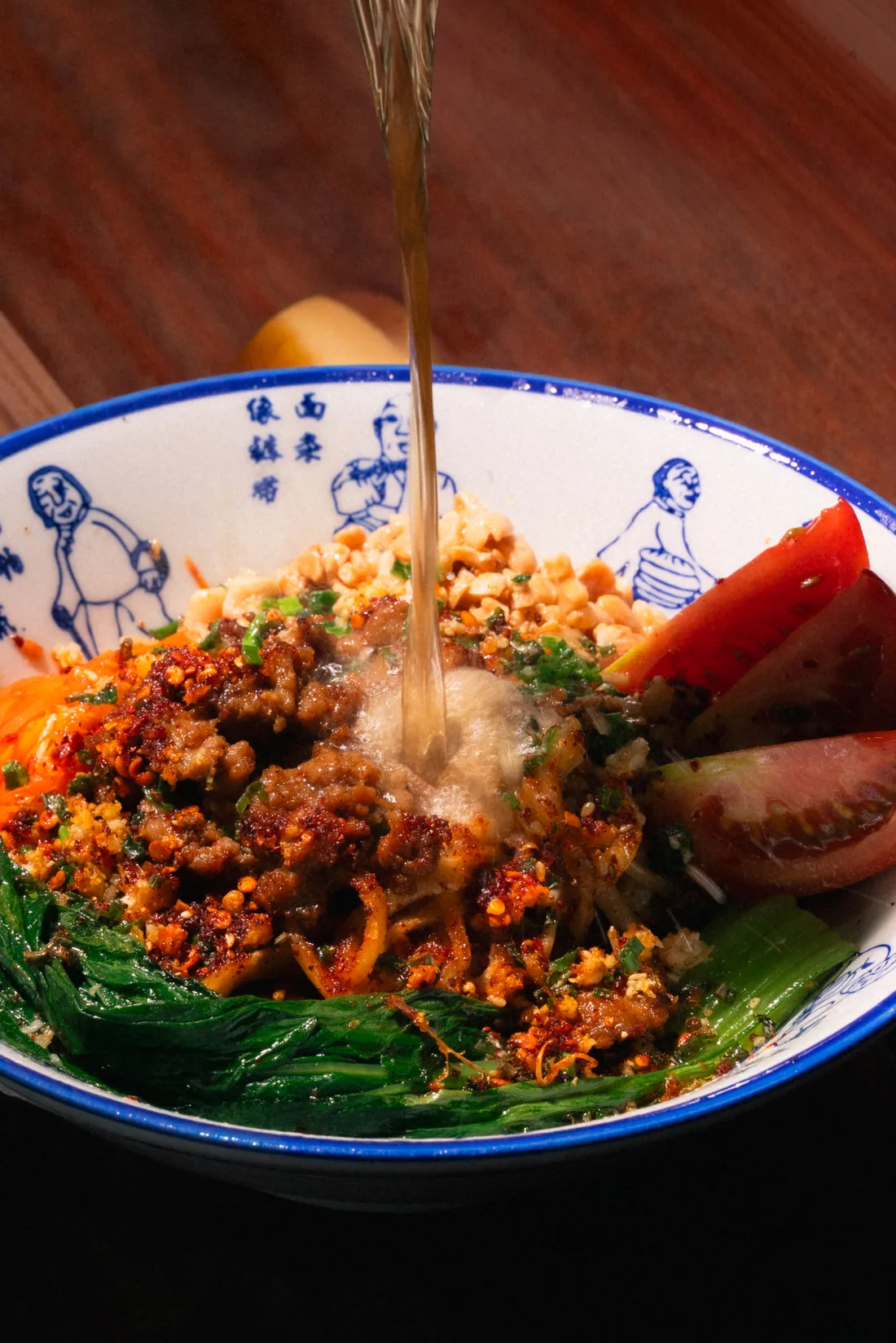 A bowl of hand-pulled noodles with rich sauce